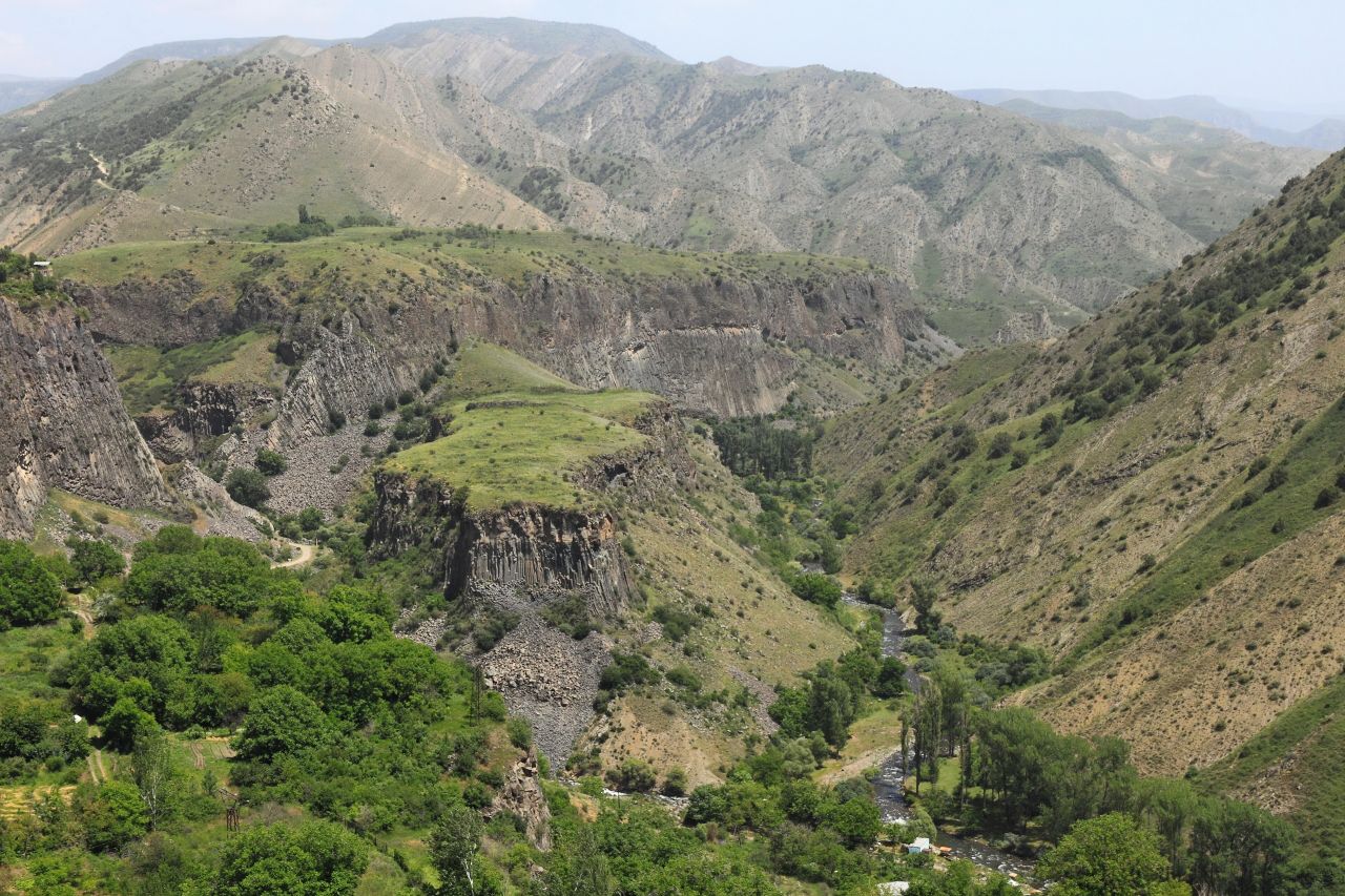 The green Azat river gorge at Garni between dry mountains